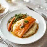 Hot honey salmon with mashed potatoes and carrots